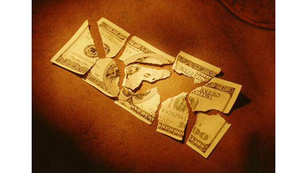 Осторожно: Доллары в Украине мошенники стали склеивать