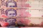 НБУ: Официальный курс гривни укрепился до 23,30 за доллар на межбанке