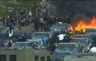 Протестующие в США подожгли полицейский автомобиль и ограбили ресторан