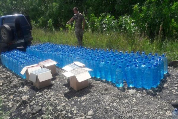 В зоне ООС на Донетчине в лесополосе нашли тонны спирта 
