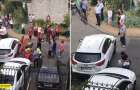 Доставали из-под авто: в Киеве водитель на скорости снес женщину и ребенка (видео)